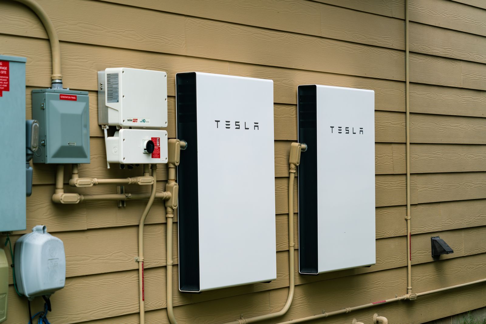 Tesla Powerwall home battery installation on exterior wall, GTA home